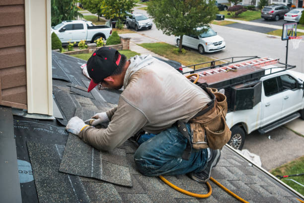 Professional Flat Roof Repair technician working in Faucett, MO